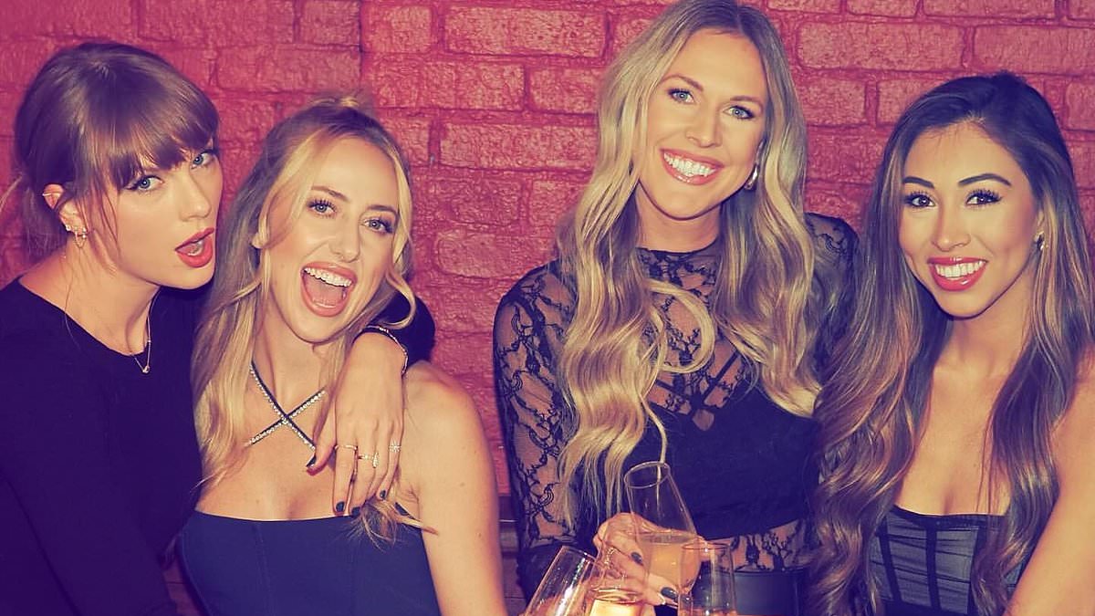 taylor-alert-–-taylor-swift-puts-her-arm-around-new-best-friend-brittany-mahomes-during-an-epic-girls-night-as-they-are-seen-sipping-champagne-with-other-wags