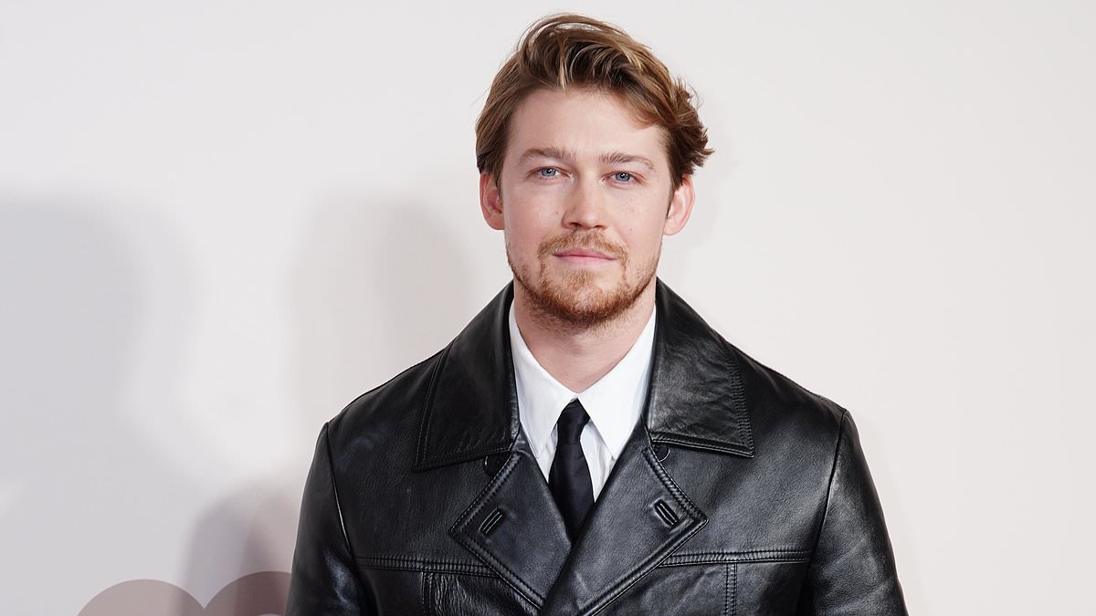 taylor-alert-–-joe-alwyn-displays-his-impeccable-sense-of-style-in-a-black-leather-jacket-as-he-leads-the-male-stars-at-the-gq-men-of-the-year-awards