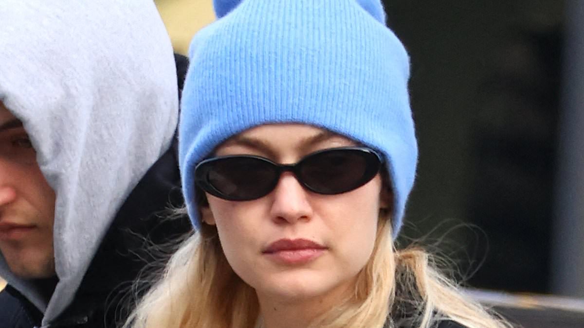 taylor-alert-–-gigi-hadid’s-bleach-blonde-hair-flows-out-from-under-blue-beanie-as-she-braves-the-nyc-chill…-after-boyfriend-bradley-cooper-‘bought’-home-near-her-family-farm