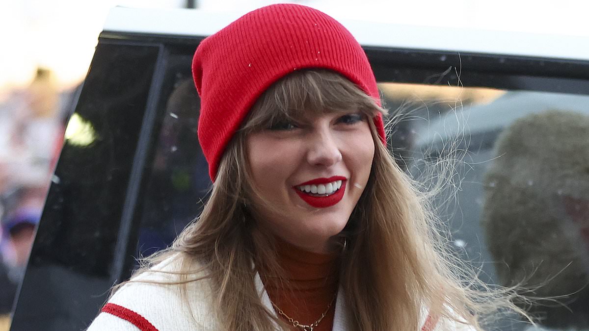 taylor-alert-–-taylor-swift-wears-$1,800-white-and-red-bomber-jacket-as-she-supports-boyfriend-travis-kelce-on-game-day