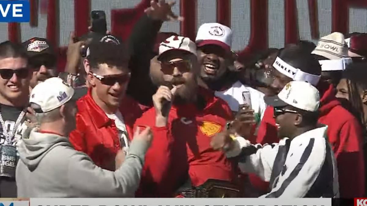 taylor-alert-–-travis-kelce-is-too-drunk-to-speak-and-has-to-be-held-up-by-his-teammates-on-stage-at-kansas-city-chiefs’-super-bowl-parade