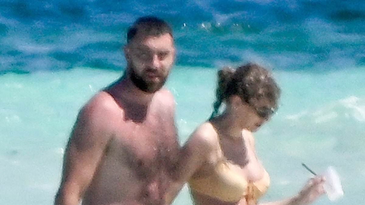 taylor-alert-–-bikini-clad-taylor-swift’s-beach-date-with-travis-kelce-draws-comparisons-to-her-famous-outing-with-ex-tom-hiddleston-(but-at-least-this-time-no-one’s-in-an-‘i-heart-t.s’-top)