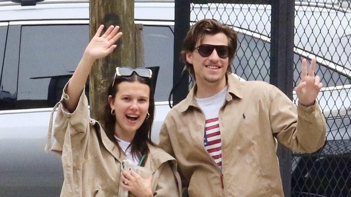 taylor-alert-–-millie-bobby-brown,-20,-and-fiance-jake-bongiovi,-21,-match-in-tan-shirts-as-they-enthusiastically-wave-during-nyc-stroll