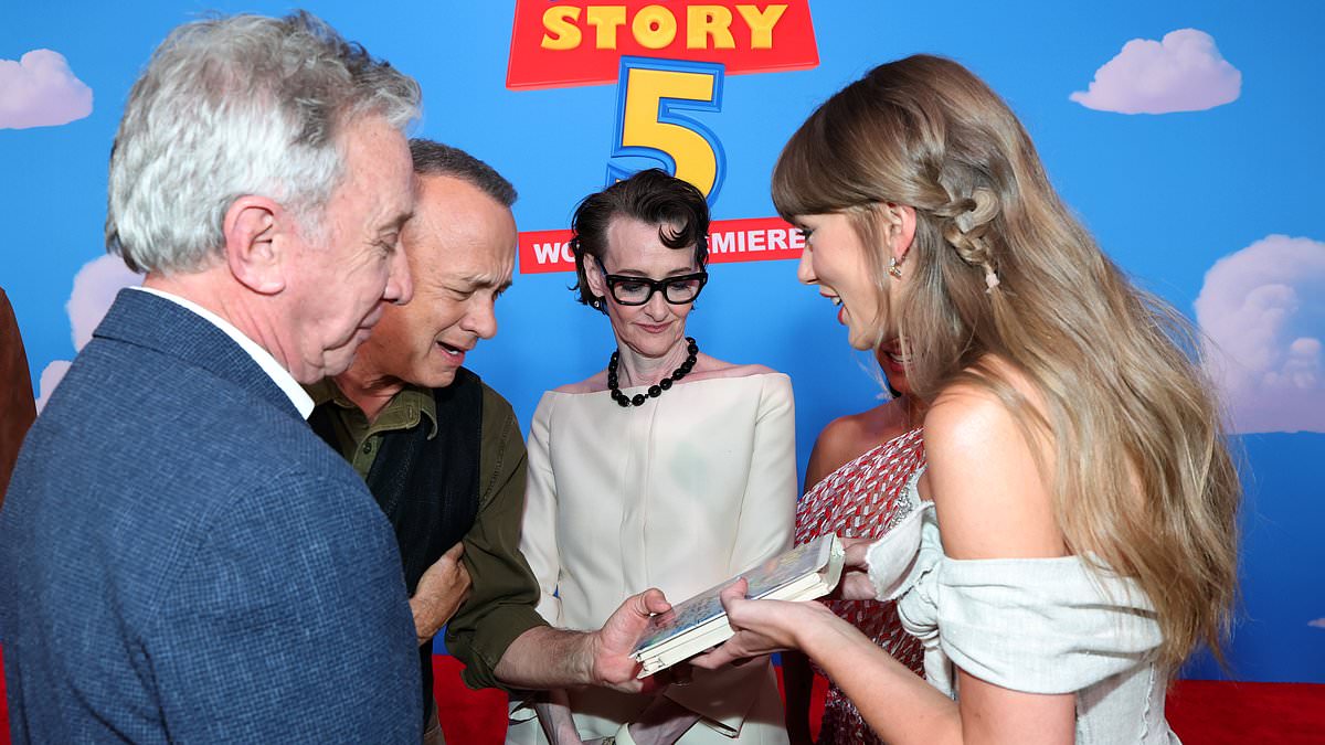 taylor-swift-alerts-–-taylor-swift-gets-her-childhood-vhs-tape-of-toy-story-signed-by-tom-hanks-and-tim-allen-in-a-sweet-moment-at-the-toy-story-5-premiere